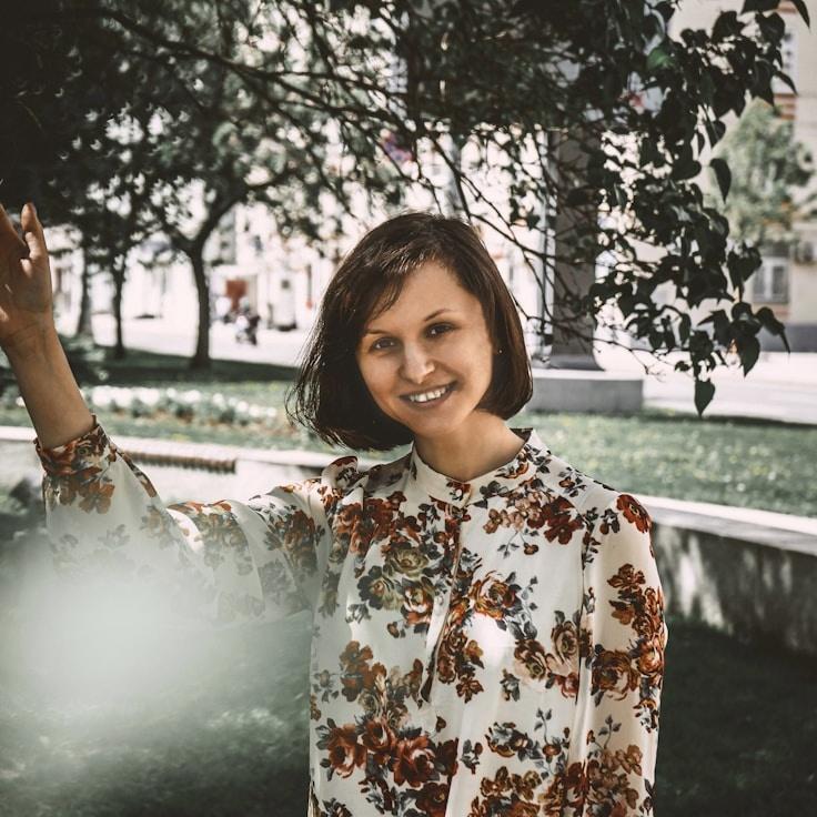 Portrait of Maya Chen, group coordinator and fusion cooking expert